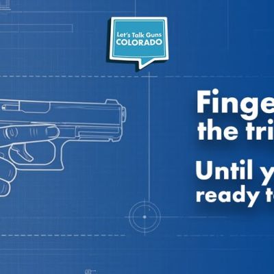 A blueprint-style illustration shows a hand holding a handgun with the index finger off the trigger. Text reads: “Finger off the trigger. Until you are ready to shoot.” A “Let’s Talk Guns Colorado” logo appears above.